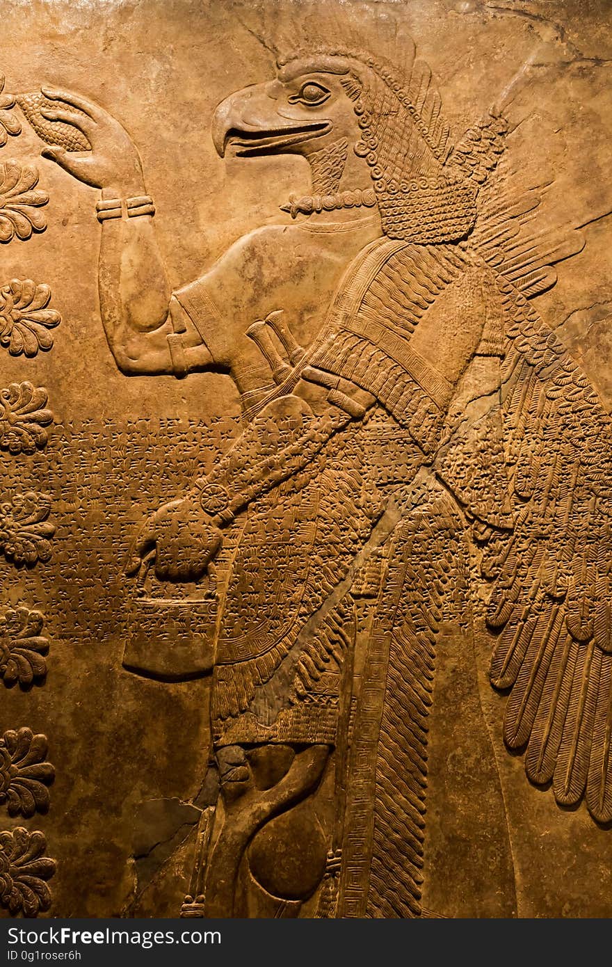 Relief from the palace of Ashurnasirpal II, king of Assyria from 883 to 859 BCE, The curation card notes: ...an eagle-headed demon engaged in a ritual to expel sickness and evil spirits from the house; the figure possibly had the function of purifying anyone entering the King&#x27;s Living Room. Los Angeles County Museum of Art &#x28;LACMA&#x29; in Los Angeles, California en.wikipedia.org/wiki/Ashurnasirpal_II