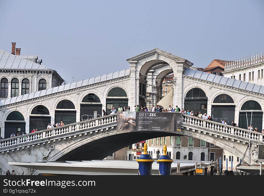 The water streets of Venice are canals which are navigated by gondolas and other small boats. During daylight hours the canals, bridges, and streets of Venice are full of tourists eager to experience the romance of this great travel destination. As night engulfs the town, tourists enjoy some fine dining at one of the many restaurants, leaving the waterways and streets quiet. The gondola is a traditional, flat-bottomed Venetian rowing boat, well suited to the conditions of the Venetian Lagoon. For centuries gondolas were once the chief means of transportation and most common watercraft within Venice. In modern times the iconic boats still have a role in public transport in the city, serving as ferries over the Grand Canal. They are also used in special regattas &#x28;rowing races&#x29; held amongst gondoliers. Their main role, however, is to carry tourists on rides throughout the canals. Gondolas are hand made using 8 different types of wood &#x28;fir, oak, cherry, walnut, elm, mahogany, larch and lime&#x29; and are composed of 280 pieces. The oars are made of beech wood. The left side of the gondola is longer than the right side. This asymmetry causes the gondola to resist the tendency to turn toward the left at the forward stroke. The water streets of Venice are canals which are navigated by gondolas and other small boats. During daylight hours the canals, bridges, and streets of Venice are full of tourists eager to experience the romance of this great travel destination. As night engulfs the town, tourists enjoy some fine dining at one of the many restaurants, leaving the waterways and streets quiet. The gondola is a traditional, flat-bottomed Venetian rowing boat, well suited to the conditions of the Venetian Lagoon. For centuries gondolas were once the chief means of transportation and most common watercraft within Venice. In modern times the iconic boats still have a role in public transport in the city, serving as ferries over the Grand Canal. They are also used in special regattas &#x28;rowing races&#x29; held amongst gondoliers. Their main role, however, is to carry tourists on rides throughout the canals. Gondolas are hand made using 8 different types of wood &#x28;fir, oak, cherry, walnut, elm, mahogany, larch and lime&#x29; and are composed of 280 pieces. The oars are made of beech wood. The left side of the gondola is longer than the right side. This asymmetry causes the gondola to resist the tendency to turn toward the left at the forward stroke.