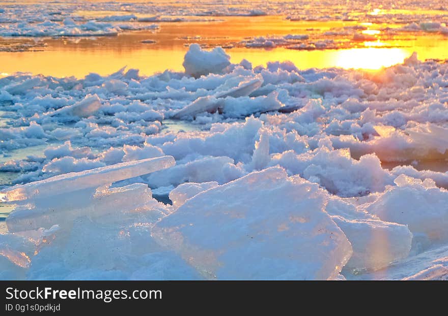 View of Frozen Lake during Sunset