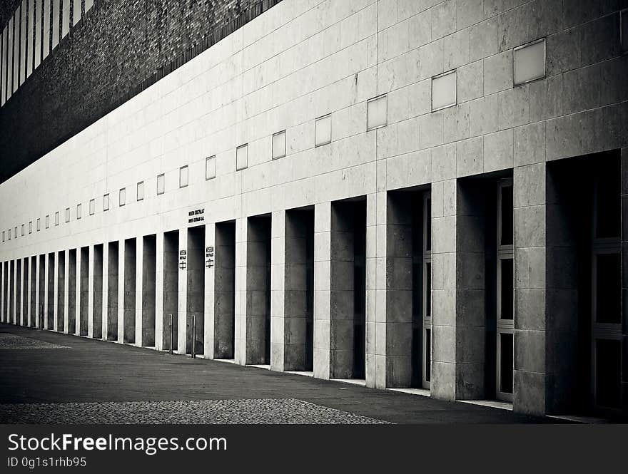 A building with doors in black and white. A building with doors in black and white.