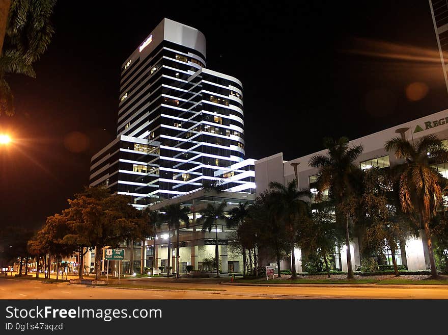 A modern building in the city at night.