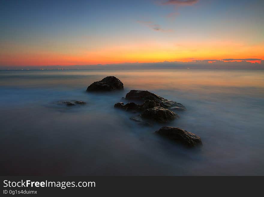 A long exposure of sea with sunrise. A long exposure of sea with sunrise.