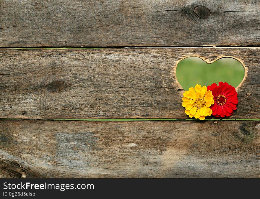 Yellow and Red Flower on Brown Heart Wooden Carved Panel