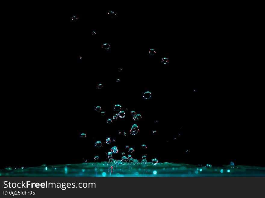 Close-up of Water Splashing Against Black Background