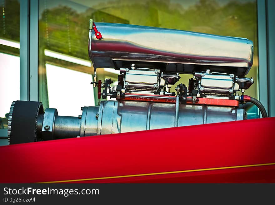 Close-up View of Red And Silver Engine