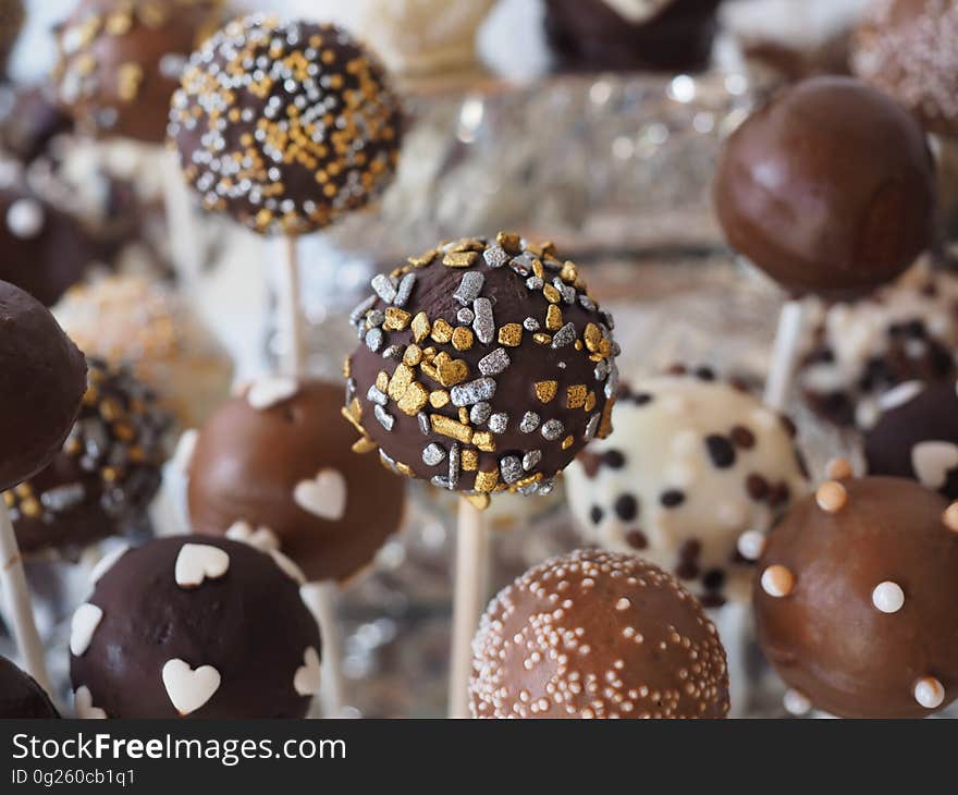 Round Chocolate Coated Pastry on White Stick