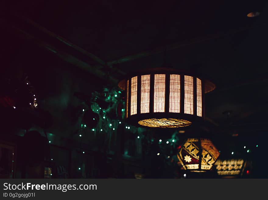 Asian style lanterns illuminated at night. Asian style lanterns illuminated at night.