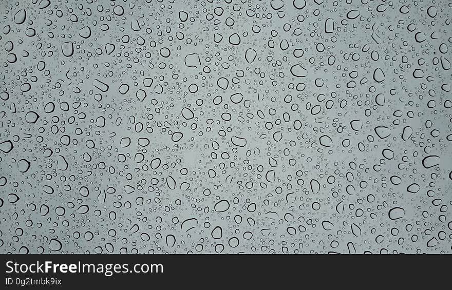 Abstraction of water drops on grey. Abstraction of water drops on grey.