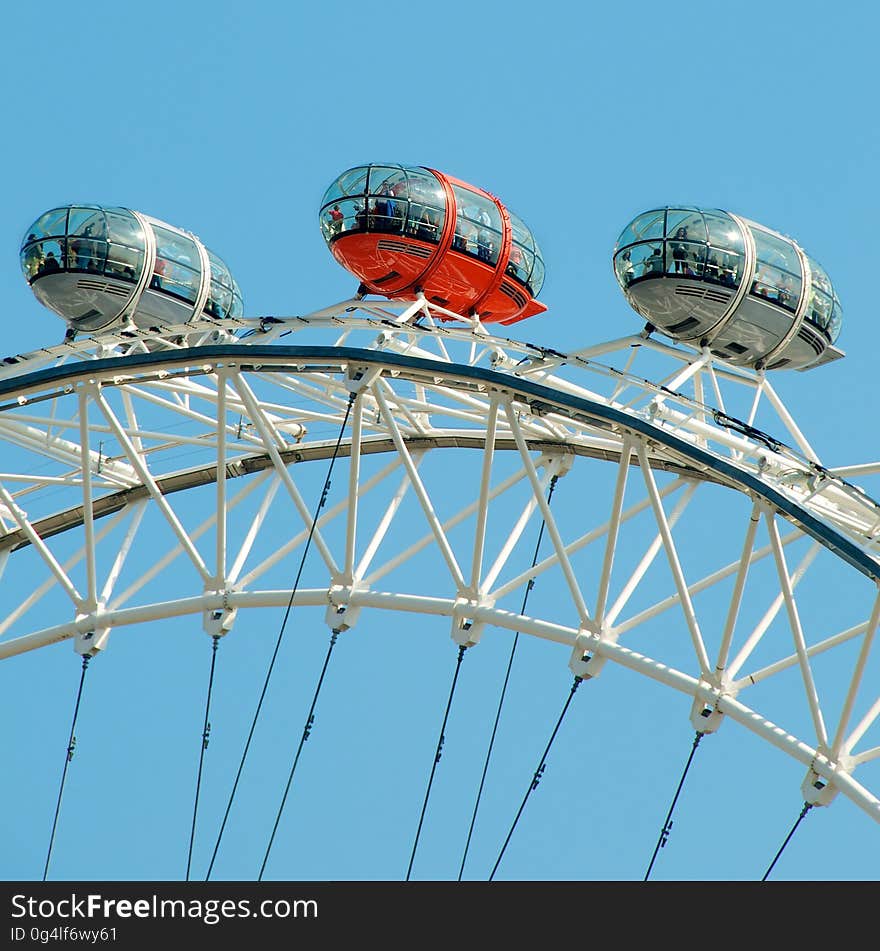 A close up of the capsules on the London Eye, a giant Ferris wheel in London, England.