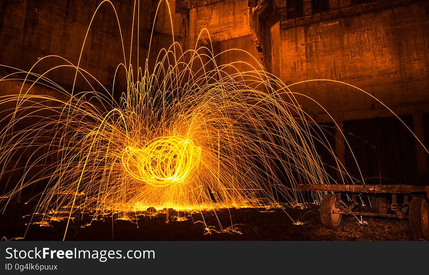 A long exposure of burning steel wool spinning around. A long exposure of burning steel wool spinning around.