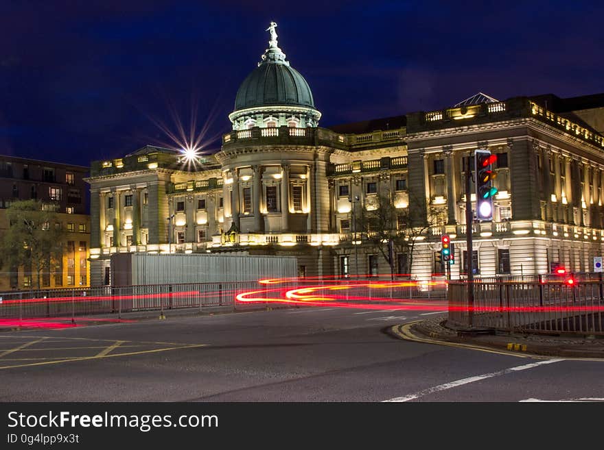 A city with light trails of traffic at night. A city with light trails of traffic at night.