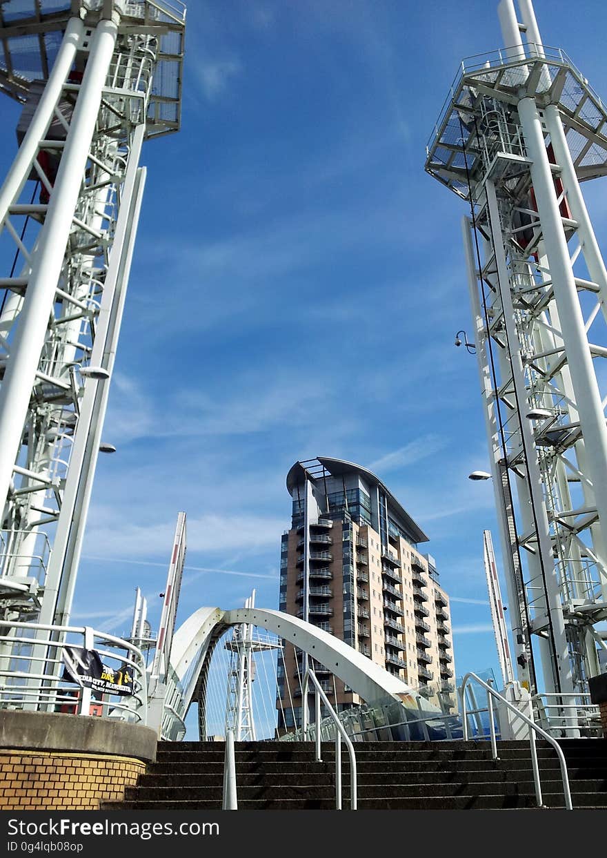 A bridge in the city with towers on the sides. A bridge in the city with towers on the sides.