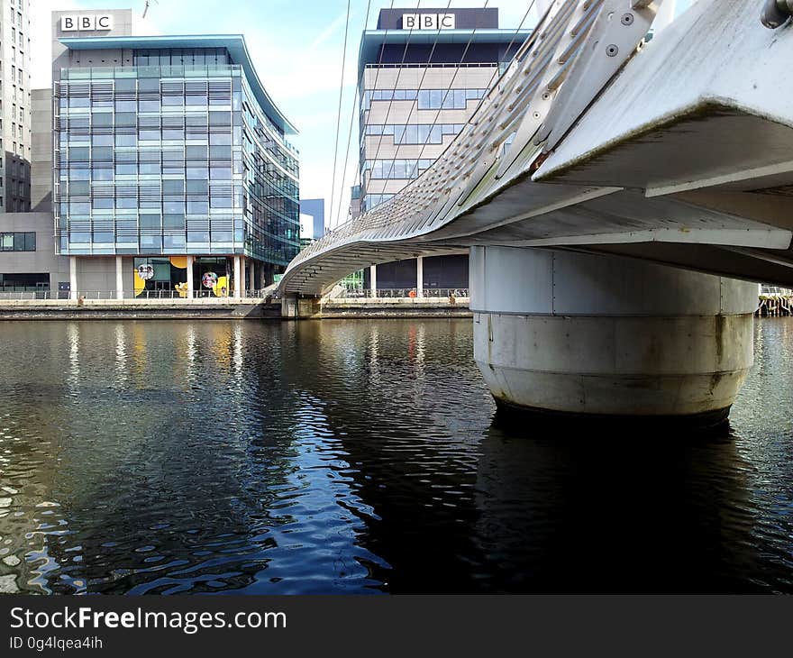 The BBC offices at Media City and the footbridge in Manchester, United Kingdom. The BBC offices at Media City and the footbridge in Manchester, United Kingdom.