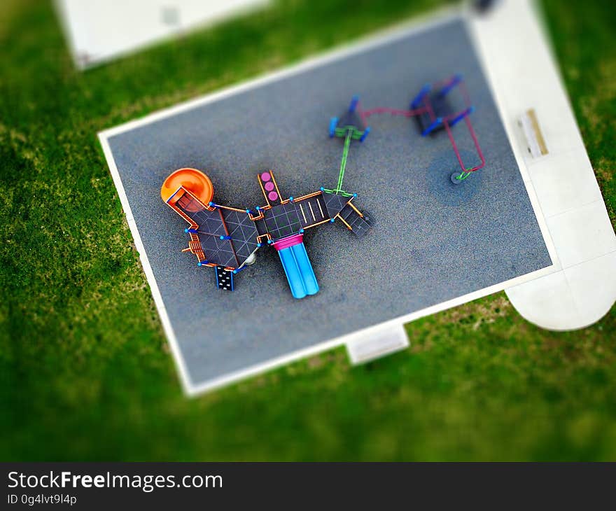 Aerial view of playground in park on sunny day.