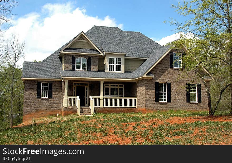 The exterior of an elegant suburban house.