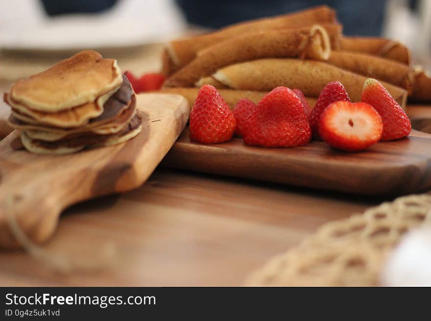 Strawberry Fruit on Brown Wooden Board