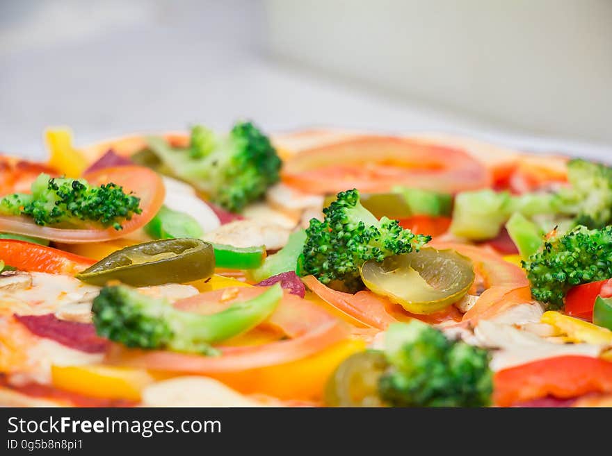 A close up of a plate of broccoli salad.