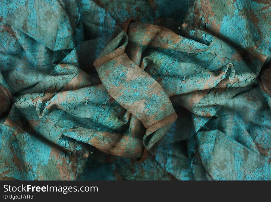 Crumpled fabric cloth texture. Grunge background.