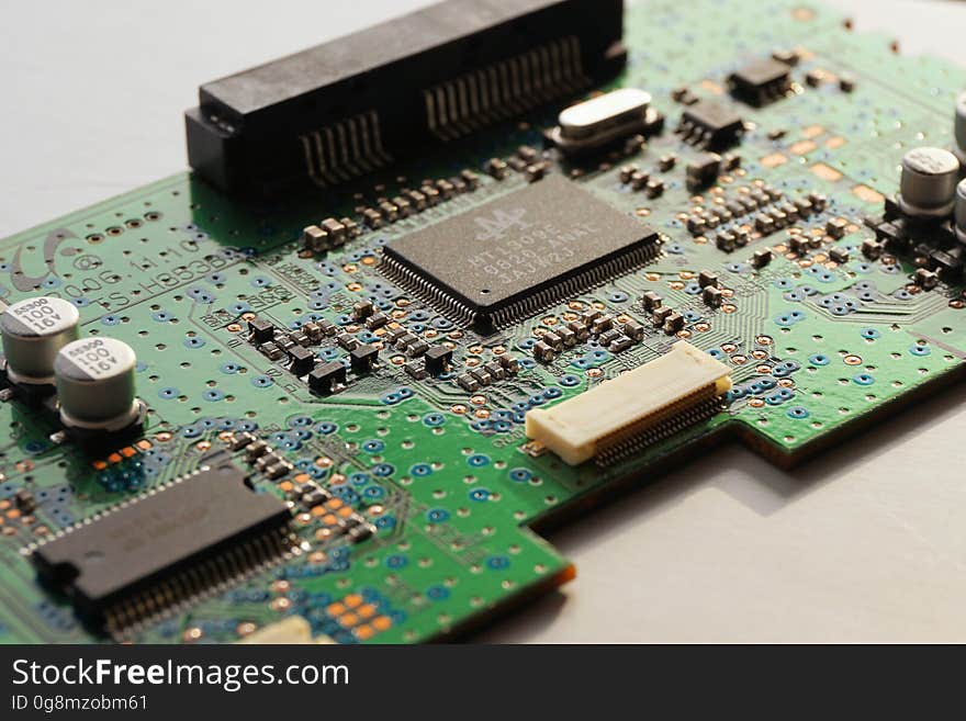 Green Black and White Computer Chip Circuit