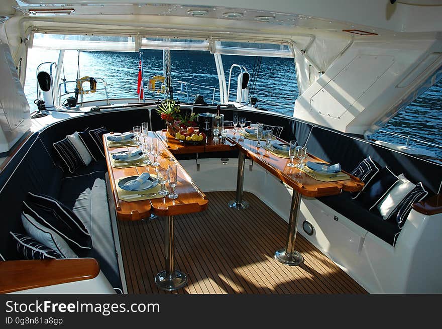 An elegantly set table on a yacht. An elegantly set table on a yacht.