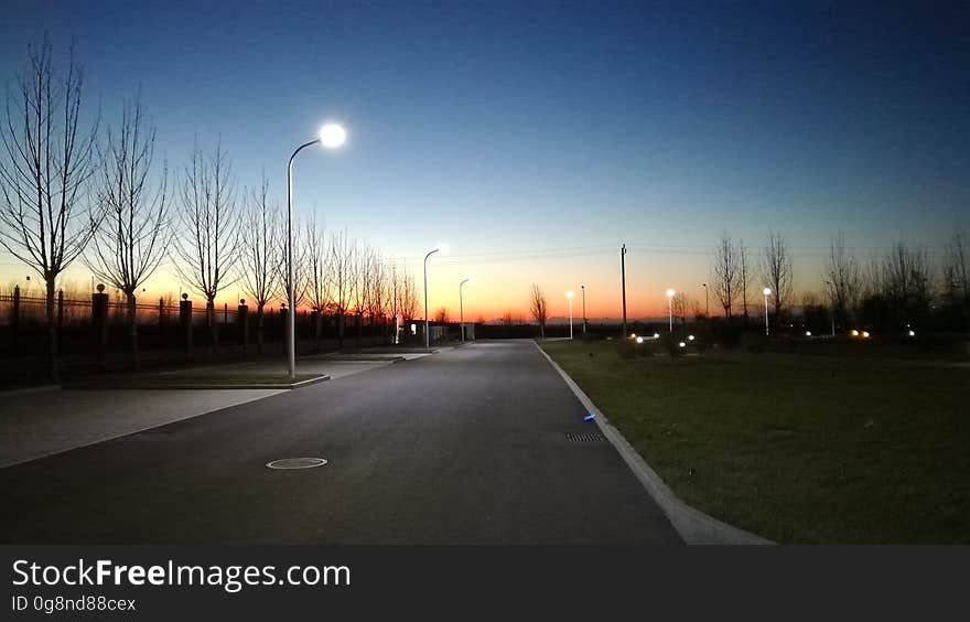 An empty road at dusk.