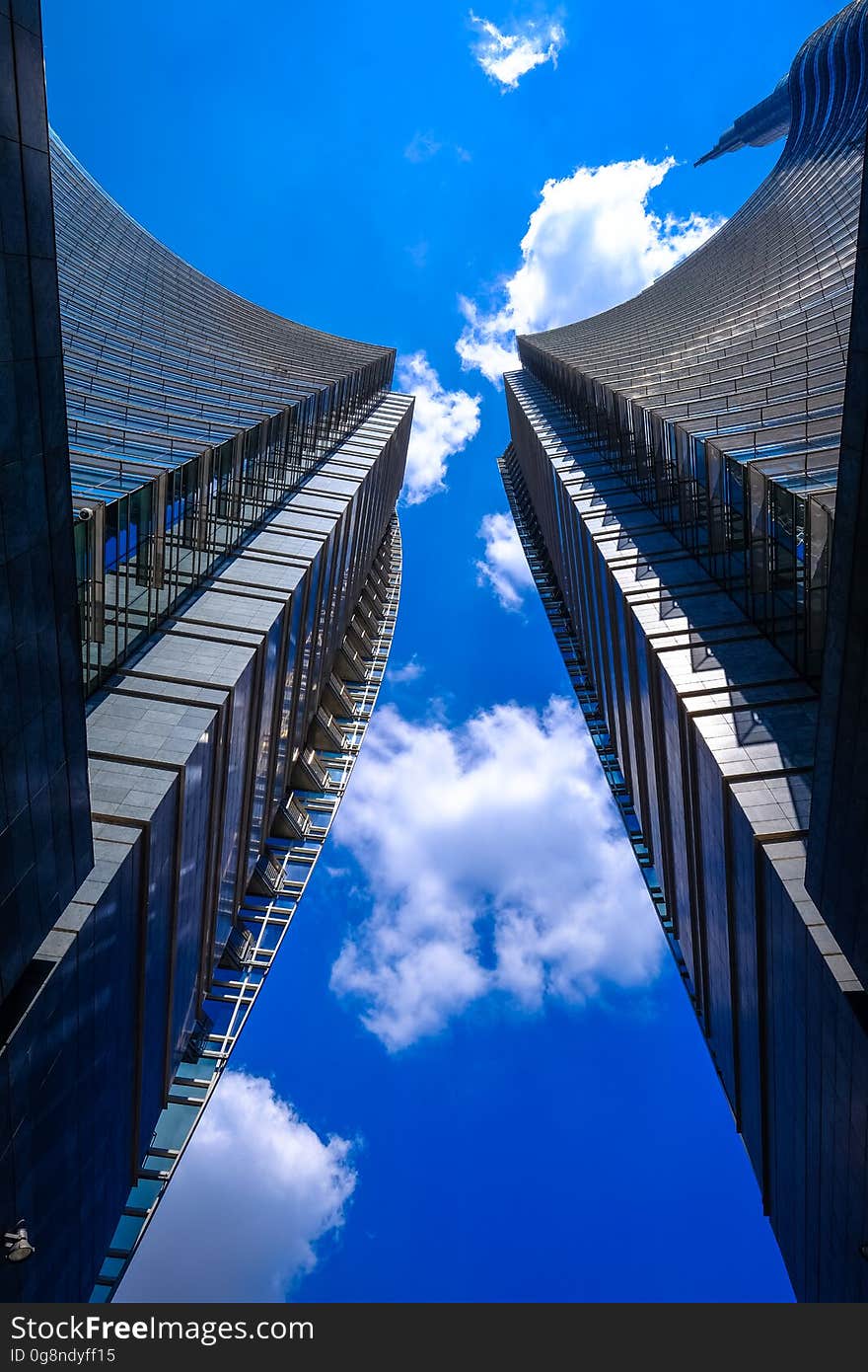 A low angle view of a pair of high-rise buildings. A low angle view of a pair of high-rise buildings.