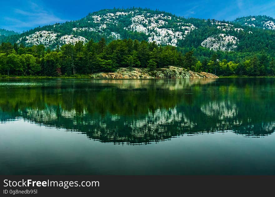 A mountain lake with a reflection.