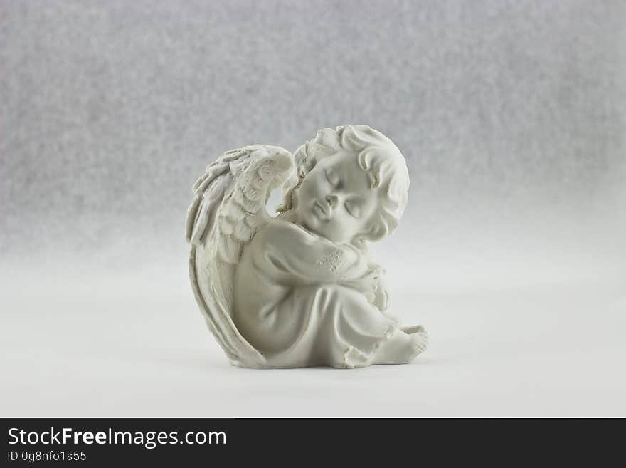 White Angel Sitting Figurine