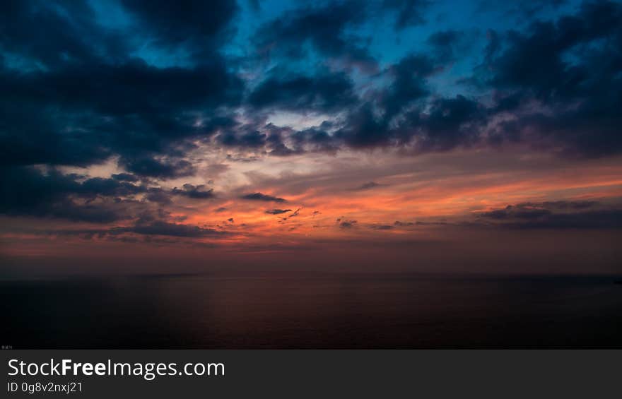 Painting of Black Cloud during Sunset