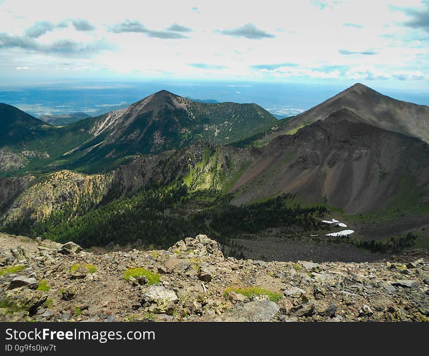 View of glacial cirque, ridges, and moraine in the Inner Basin of the San Francisco Peaks. View into the interior of the Inner Basin along Humphreys Trail No. 50. The trail starts at the Arizona Snowbowl and winds steeply up to Humphreys Peak, the highest point in Arizona at 12,633 feet. Humphreys Peak is one of several named peaks in the San Francisco Peaks &#x28;aka San Francisco Mountain or simply &quot;the Peaks&quot;&#x29;. The mountain is an extinct stratovolcano. The 5+ mile hike ascends over an elevation gain of over 3,000 feet, and generally take 6 to 8 hours to complete. Brent Johnston of the Coconino National Forest took this photo on a weekend family hike, July 24, 2015. Credit: U.S. Forest Service, Coconino National Forest. For more information about this trail, see the Humphreys Trail No. 51 trail description on the Coconino National Forest website.