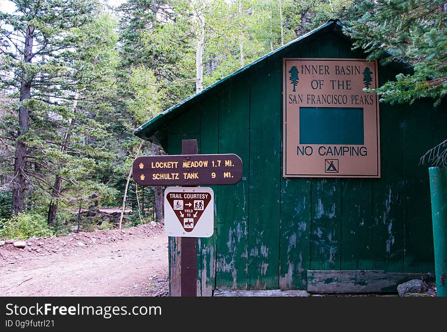 Buildings at Jack Spring. The Inner Basin Trail ascends from Lockett Meadow into the caldera of the San Francisco Peaks, an extinct volcano and home of the tallest peaks in Arizona. The first 1.7 miles of the trail winds through the extensive aspen forest flanking the upper reaches of the Peaks, joining the Waterline Trail briefly before following a jeep road into the caldera. The trail starts at an elevation of 8665 feet, gaining approximately 1200 feet over 2 miles on its way into the Inner Basin. The trail continues another 2 miles, gaining an additional 600 feet or so to join up with the Weatherford Trail. Photo by Deborah Lee Soltesz, August 2015. Credit: U.S. Forest Service, Coconino National Forest. For more information about this trail, see the Inner Basin No. 29 trail description on the Coconino National Forest website.