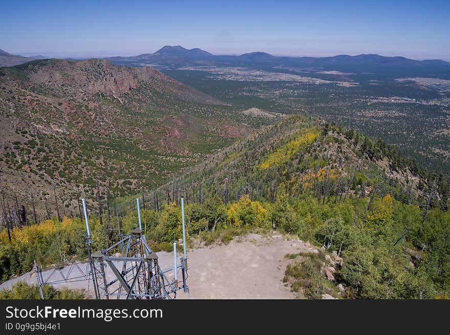 Mid-September fall color viewed from Elden Lookout Tower. Hikers, bikers, and equestrians can reach the top of Mount Elden and the Elden Lookout Tower can be accessed via Sunset Trail, Elden Lookout Trail, Heart Trail, and several other trails in the Mount Elden/Dry Lake Hills trail system. Motorized vehicles can get to the top via Elden Lookout Road. Photo by Deborah Lee Soltesz, September 17, 2016. Credit: U.S. Forest Service, Coconino National Forest. For more information visit Coconino National Forest