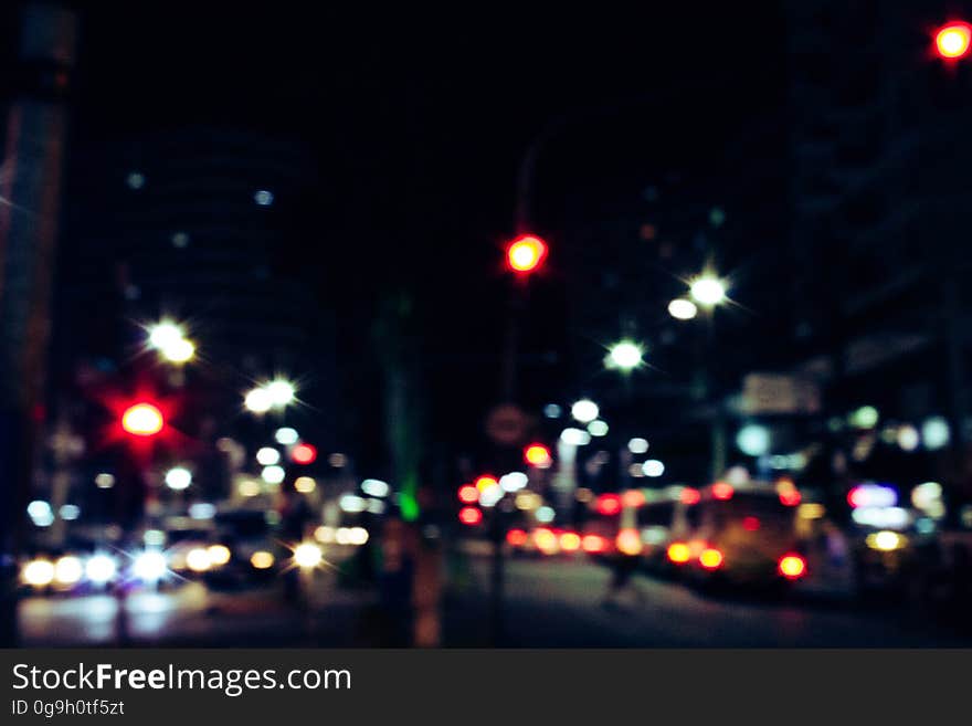 A night street in soft focus.