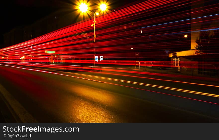 A night view of a city with a long exposure of the passing traffic. A night view of a city with a long exposure of the passing traffic.