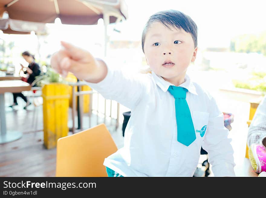 Chinese boy on the street in school uniform