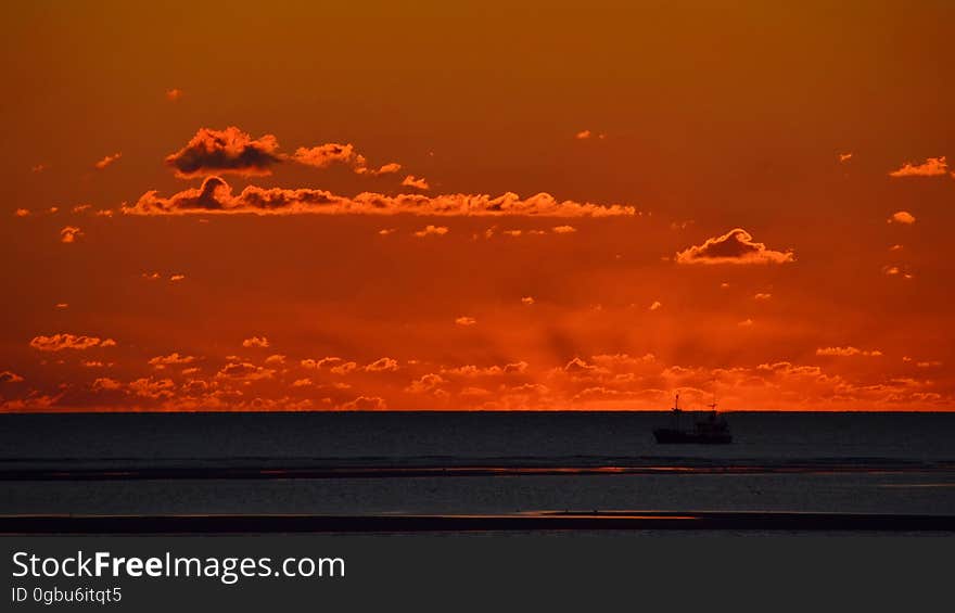 Boat in front of Sunset