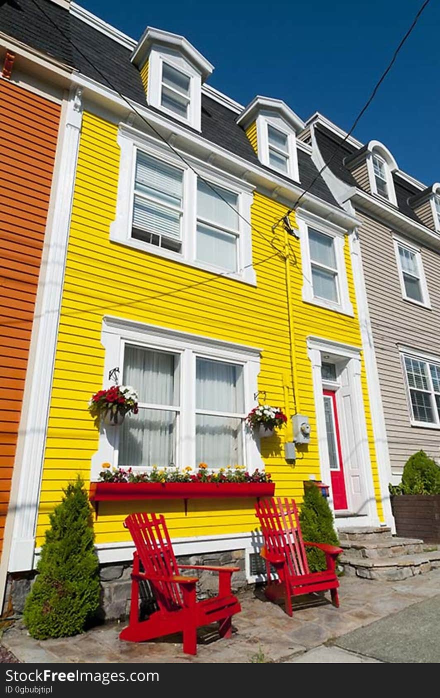 Brightly painted clapboard houses in the city of St John&#x27;s, Newfoundland, Canada.