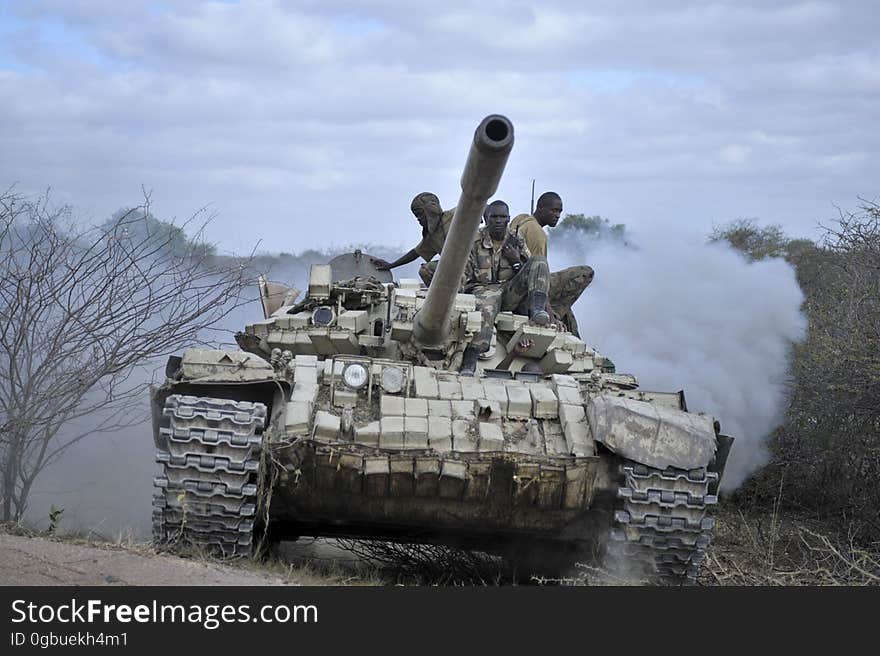 Ugandan soldiers, operating under the African Union Mission in Somalia &#x28;AMISOM&#x29;, advance towards Buur-Hakba from their former position in the town of Leego alongside members of the Somali National Army &#x28;SNA&#x29; on February 24, 2013. AMISOM and SNA forces advanced towards Buur-Hakba to open up the road between Mogadishu and Somalia&#x27;s second city Baidoa and connect the two areas under the control of the Somali Federal Government supported by AMISOM. AU UN IST PHOTO / TOBIN JONES. Ugandan soldiers, operating under the African Union Mission in Somalia &#x28;AMISOM&#x29;, advance towards Buur-Hakba from their former position in the town of Leego alongside members of the Somali National Army &#x28;SNA&#x29; on February 24, 2013. AMISOM and SNA forces advanced towards Buur-Hakba to open up the road between Mogadishu and Somalia&#x27;s second city Baidoa and connect the two areas under the control of the Somali Federal Government supported by AMISOM. AU UN IST PHOTO / TOBIN JONES.