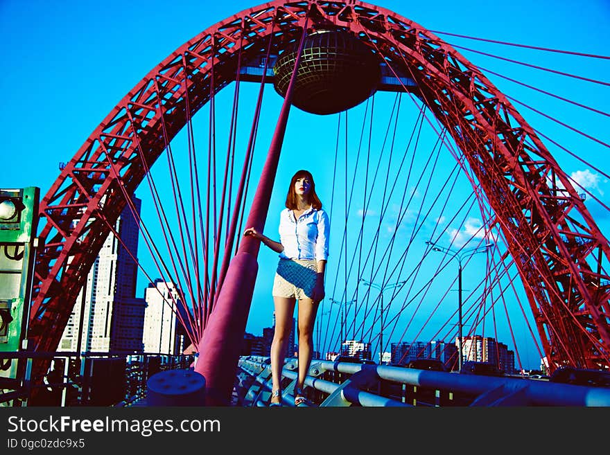 Abstract advertising illustration of young woman and circus wheel in Moscow, Russia. Abstract advertising illustration of young woman and circus wheel in Moscow, Russia.