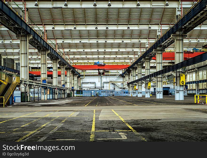 A view inside an empty warehouse or manufacturing building.