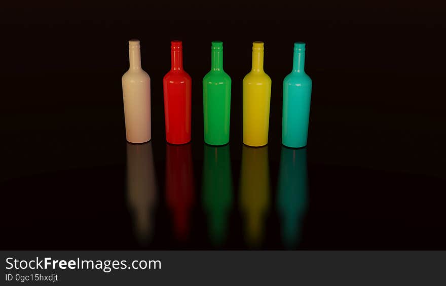 Colorful painted bottles lined up on black. Colorful painted bottles lined up on black.