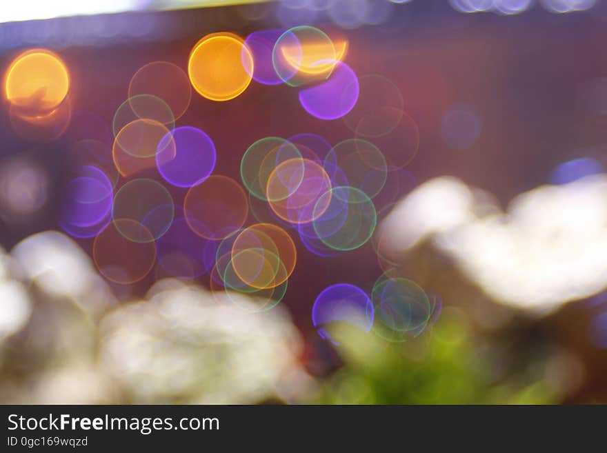 A blurred background with bokeh lights. A blurred background with bokeh lights.