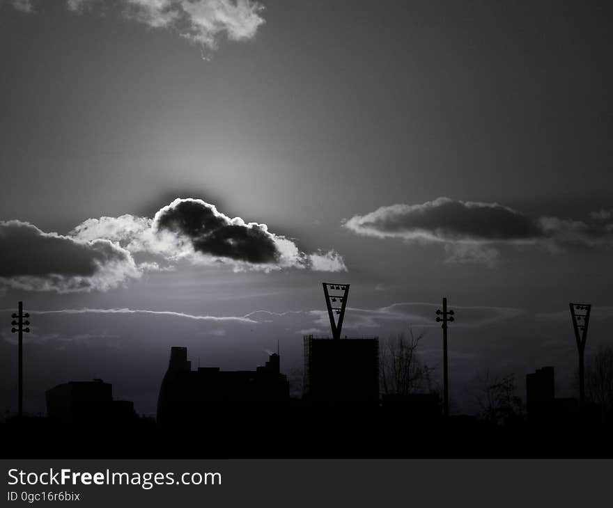 The silhouettes of buildings against the sky in black and white. The silhouettes of buildings against the sky in black and white.