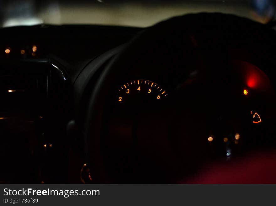 Speedometer gauge on dash of automobile interior. Speedometer gauge on dash of automobile interior.