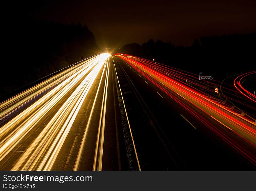 Speeding Car on High Way during Night Time