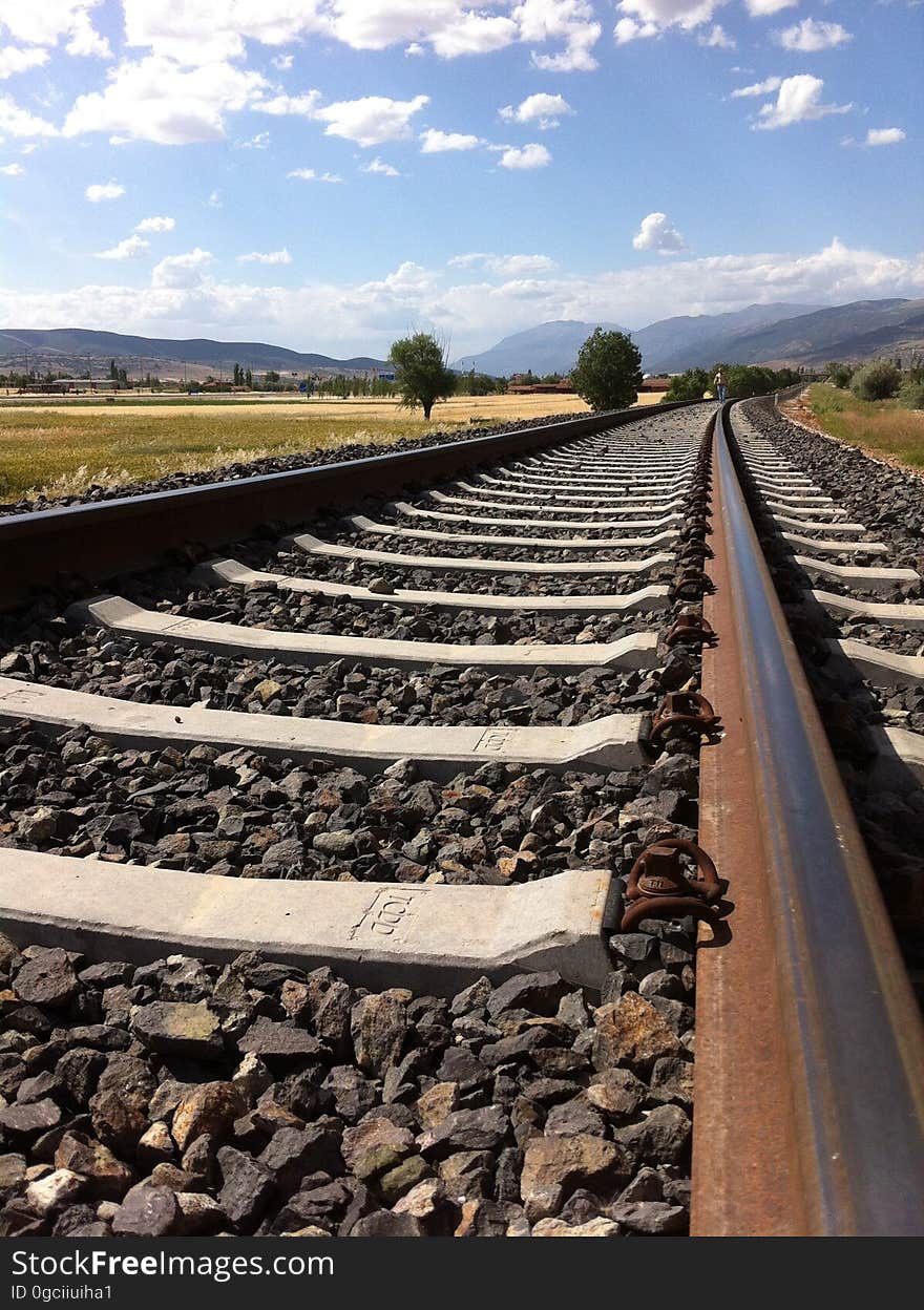 Railroad Tracks Against Sky