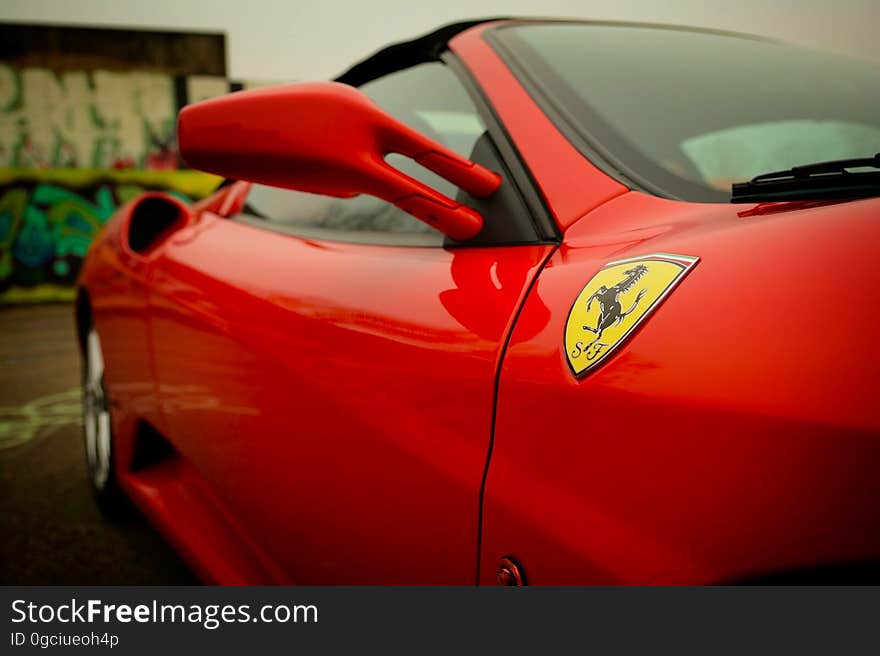 Closeup of a red Ferrari.