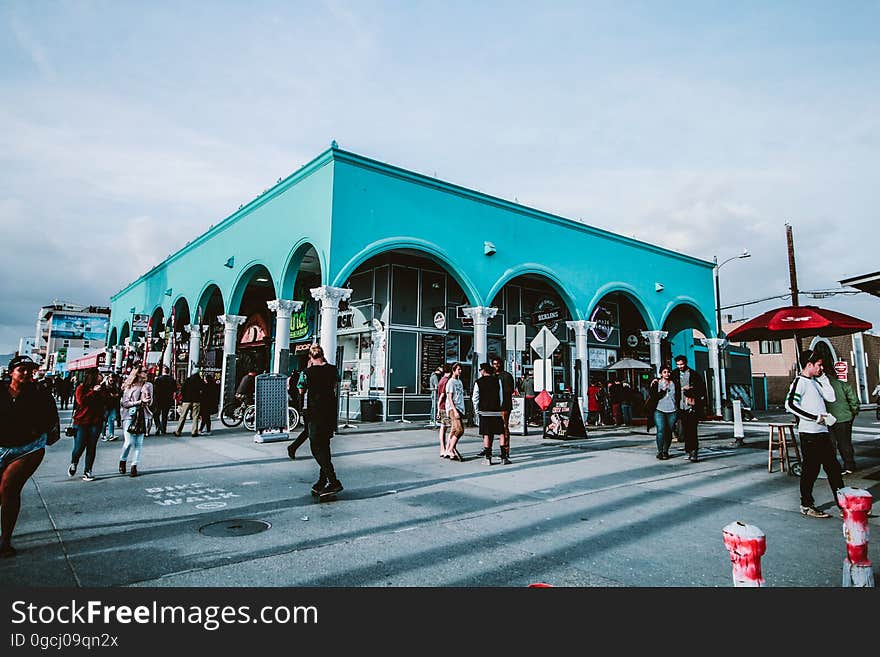 People strolling along at Venice boardwalk.