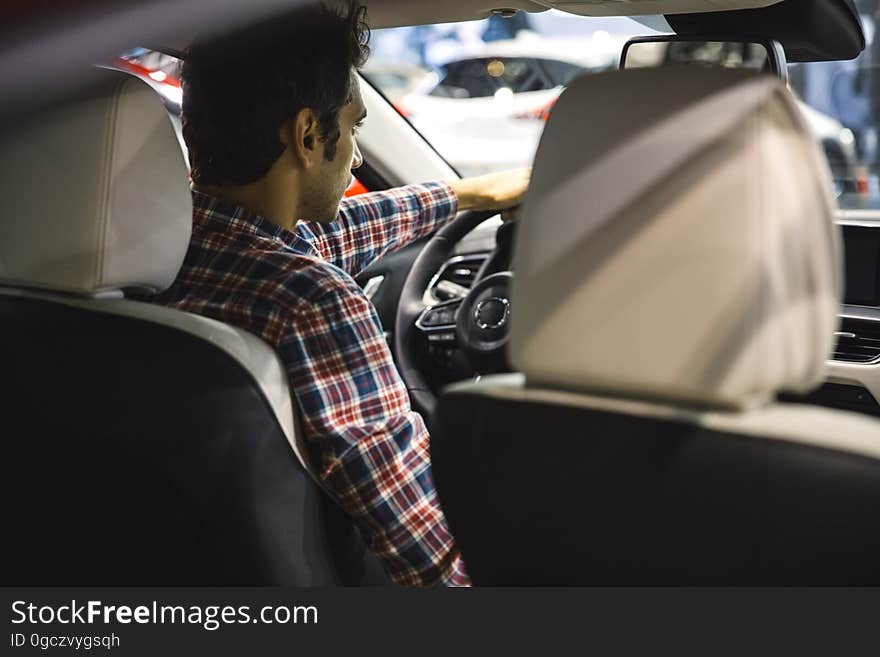 Young man driving car