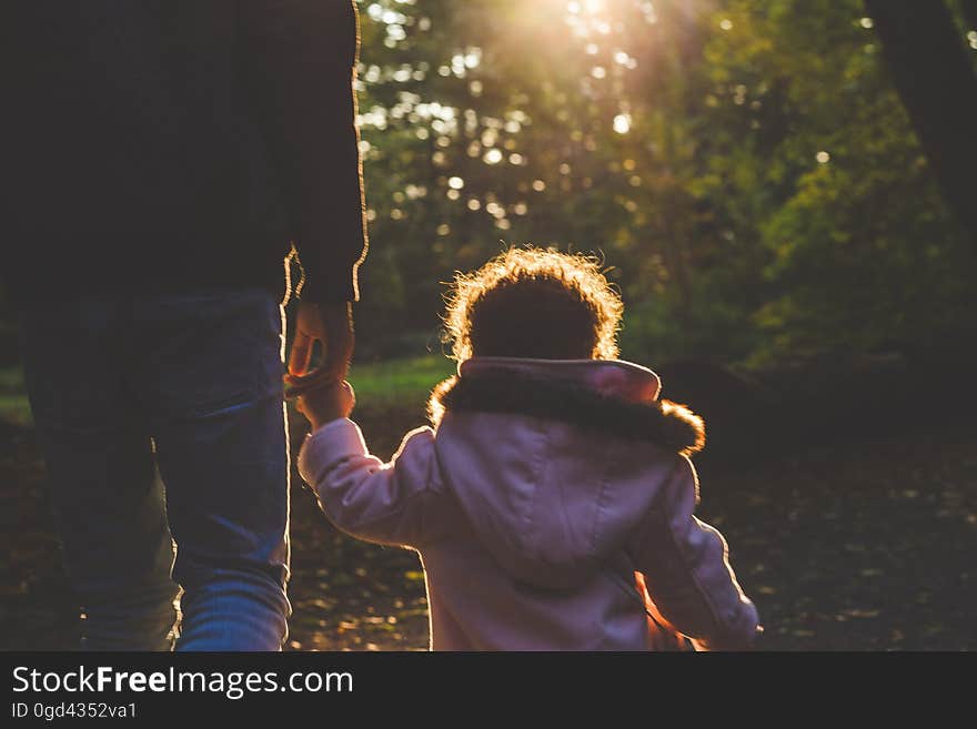 Toddler in White Hoodie during Daytime